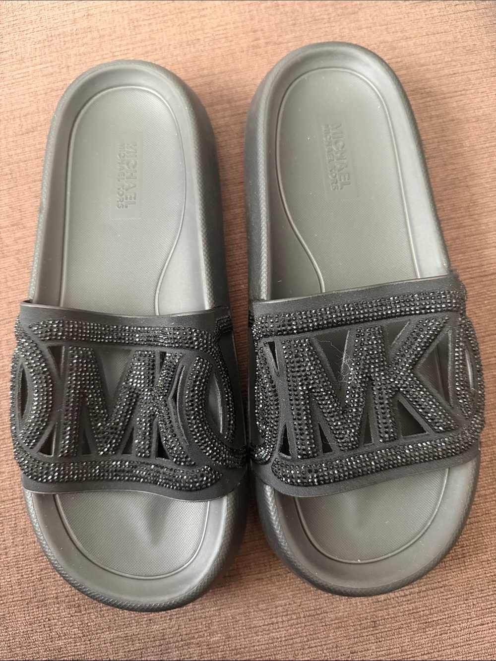 MICHAEL KORS • Splash slip-on sandal in crystal-orned scuba fabric • W 7 1/2